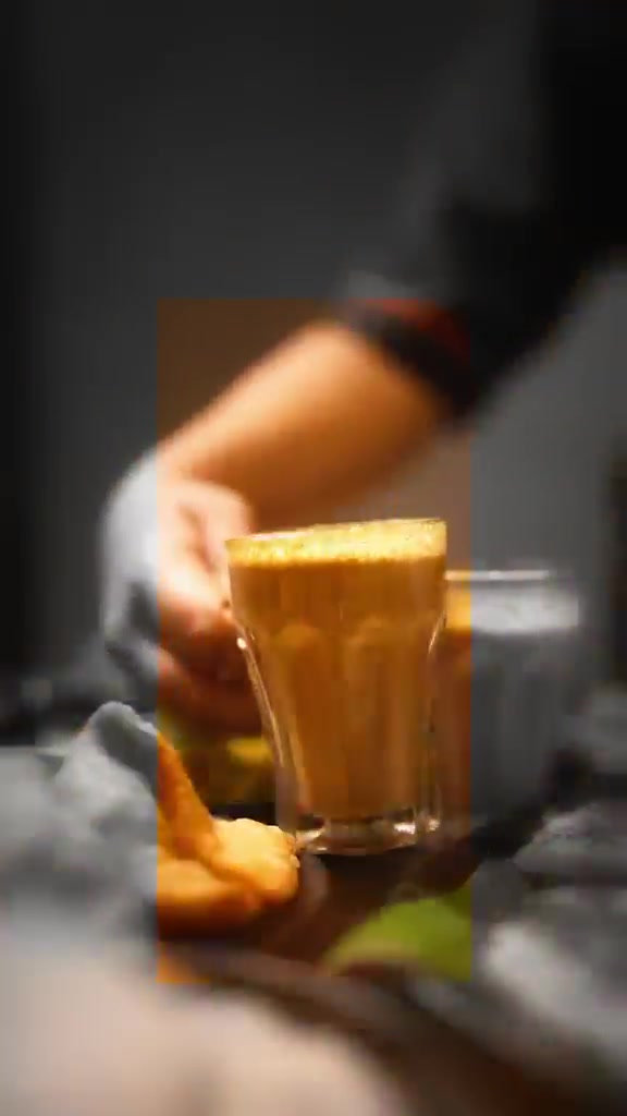 A glass of filter coffee and a vada at Sri Ram Cafe, Koramangala